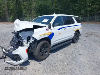 2022 Chevrolet Tahoe Commercial z VIN 1GNSCLED4NR222340, wystawiony jako IAAI lot #42321388 z przebiegiem Nie podano mil oraz . Historia ofert i sprzedaży dostępna na DreamBid. Obrazek 17.