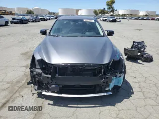 2014 Infiniti Q50 Hybrid Premium with VIN JN1AV7AP5EM690504, listed as a Copart auction lot 55511065 with 79,307 mi miles and Salvage title. Bid and sale history available at DreamBid. Image 5.