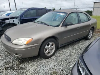 2005 Ford Taurus SE with VIN 1FAFP53U95A275679, listed as a Copart auction lot 63047285 with 143,229 mi miles and Salvage title. Bid and sale history available at DreamBid. Image 1.