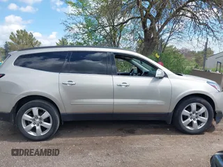 2016 Chevrolet Traverse LT z VIN 1GNKVGKD3GJ195932, wystawiony jako IAAI lot #42243260 z przebiegiem 122 449 mil mil oraz . Historia ofert i sprzedaży dostępna na DreamBid. Obrazek 13.