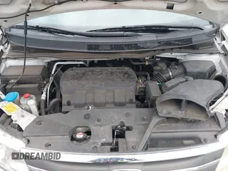 2013 Honda Odyssey Touring with VIN 5FNRL5H99DB041328, listed as a IAAI auction lot 41797520 with 148,523 mi miles and . Bid and sale history available at carsss.com. Image 10.