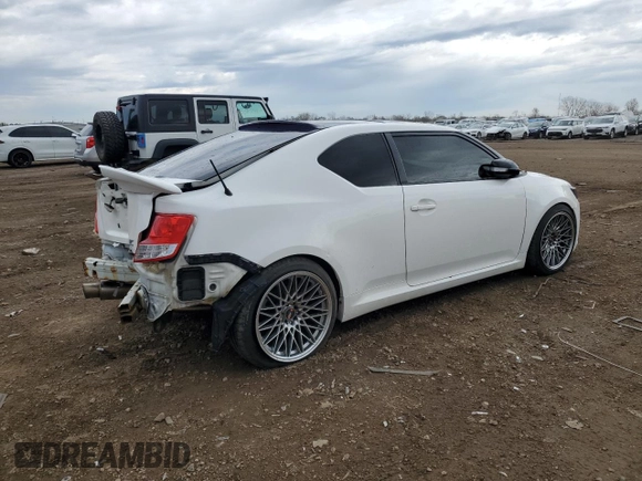 2012 Scion tC z VIN JTKJF5C71C3032427, wystawiony jako Copart lot #54160695 z przebiegiem 59 826 mil mil oraz Szkoda całkowita • Salvage title. Historia ofert i sprzedaży dostępna na DreamBid. Obrazek 3.