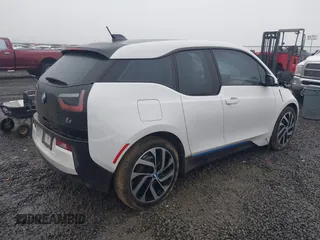 2014 BMW i3 z VIN WBY1Z4C55EV273629, wystawiony jako IAAI lot #41337472 z przebiegiem 113 122 mil mil oraz . Historia ofert i sprzedaży dostępna na DreamBid. Obrazek 4.