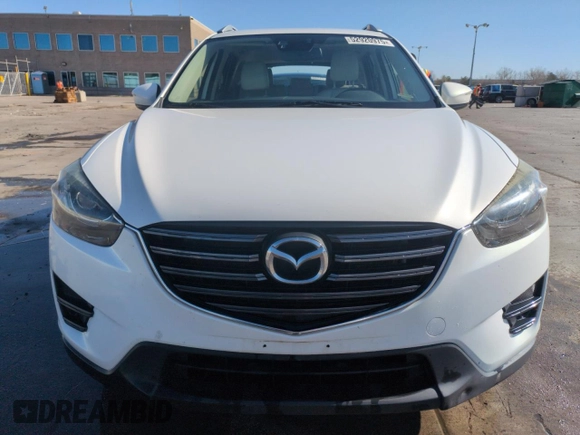 2016 Mazda CX-5 Grand Touring with VIN JM3KE4DY8G0671256, listed as a Copart auction lot 52920975 with 87,822 mi miles and Non Repairable. Bid and sale history available at carsss.com. Image 5.
