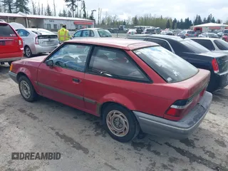 1989 Ford Escort z VIN 1FAPP9194KW249161, wystawiony jako IAAI lot #41988003 z przebiegiem 75 974 mil mil oraz . Historia ofert i sprzedaży dostępna na DreamBid. Obrazek 3.