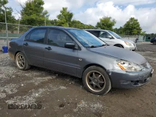 2005 Mitsubishi Lancer ES with VIN JA3AJ26E35U024307, listed as a Copart auction lot 74433184 with 189,115 mi miles and Salvage Title. Bid and sale history available at carsss.com. Image 4.