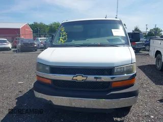 2014 Chevrolet Express Passenger LT с VIN 1GAZG1FG7E1116223, выставлен на аукционе IAAI как лот 42600132 с пробегом 297 913 миль миль и . История ставок и продаж доступна на DreamBid. Изображение 6.