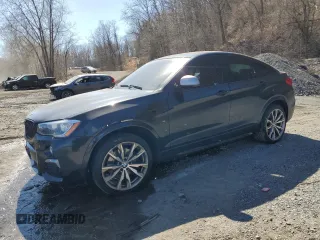 2018 BMW X4 M40i z VIN 5UXXW7C52J0W64877, wystawiony jako Copart lot #50144415 z przebiegiem 74 731 mil mil oraz Szkoda całkowita • Salvage title. Historia ofert i sprzedaży dostępna na DreamBid. Obrazek 1.