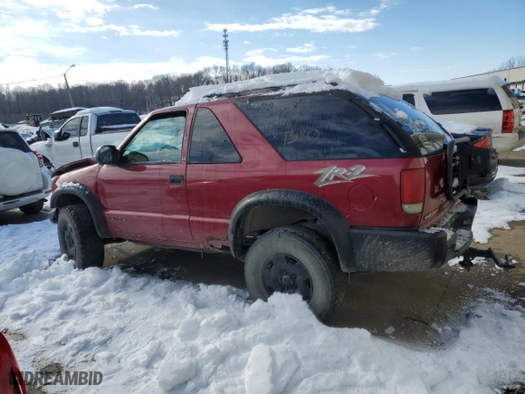 2002 Chevrolet Blazer LS with VIN 1GNCT18W12K108077, listed as a Copart auction lot 87490474 with 130,244 mi miles and Salvage Title. Bid and sale history available at carsss.com. Image 2.