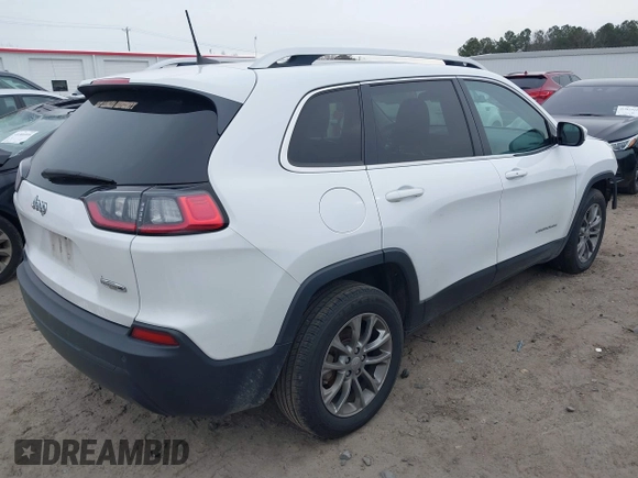 2020 Jeep Cherokee Latitude Plus with VIN 1C4PJLLB3LD543821, listed as a IAAI auction lot 41290132 with 130,137 mi miles. Bid and sale history available at carsss.com. Image 4.