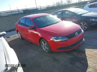 2012 Volkswagen Jetta TDI w/Premium with VIN 3VWLL7AJ3CM027986, listed as a IAAI auction lot 41453897 with 68,928 mi miles and . Bid and sale history available at DreamBid. Image 1.