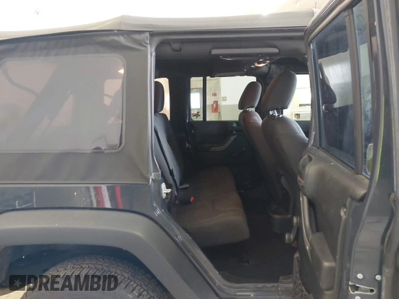 2017 Jeep Wrangler Unlimited Sport with VIN 1C4BJWDG3HL503676, listed as a IAAI auction lot 41953232 with 94,819 mi miles. Bid and sale history available at carsss.com. Image 8.
