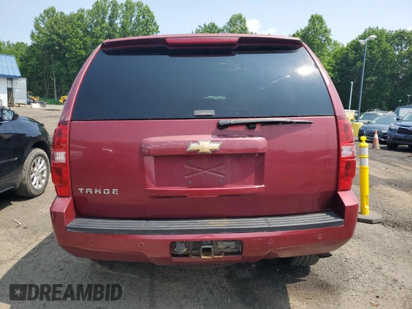 2007 Chevrolet Tahoe LTZ with VIN 1GNFK13007J153690, listed as a Copart auction lot 60614905 with 221,910 mi miles and Salvage title. Bid and sale history available at DreamBid. Image 6.