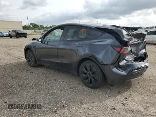 2024 Tesla Model Y с VIN 7SAYGDED4RA329638, выставлен на аукционе Copart как лот 54562525 с пробегом 8 606 миль миль и Списание • Salvage title. История ставок и продаж доступна на DreamBid. Изображение 2.