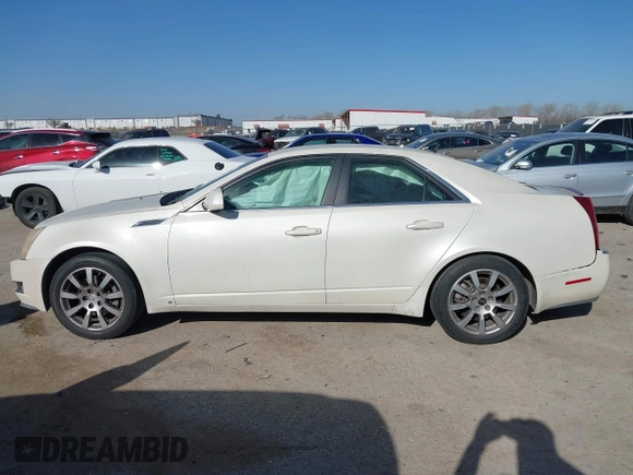 2008 Cadillac CTS RWD w/1SA with VIN 1G6DF577380211952, listed as a IAAI auction lot 41828784 with 273,085 mi miles. Bid and sale history available at carsss.com. Image 14.