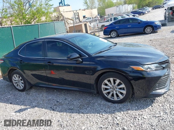 2019 Toyota Camry LE with VIN 4T1B11HK1KU718374, listed as a IAAI auction lot 42071905 with 86,460 mi miles and . Bid and sale history available at DreamBid. Image 13.
