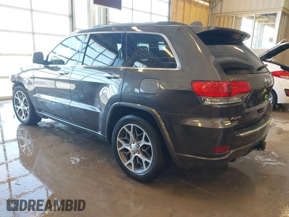 2020 Jeep Grand Cherokee Overland with VIN 1C4RJFCGXLC419668, listed as a IAAI auction lot 41608508 with 104,088 mi miles. Bid and sale history available at carsss.com. Image 3.