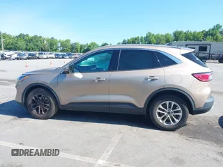 2021 Ford Escape SE with VIN 1FMCU0G67MUA00194, listed as a IAAI auction lot 42406942 with 62,553 mi miles and . Bid and sale history available at DreamBid. Image 14.