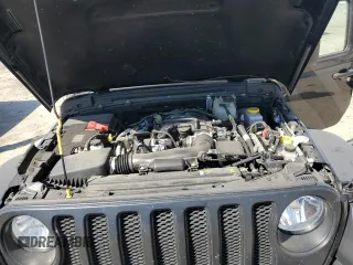2023 Jeep Wrangler Sport with VIN 1C4HJXAG3PW618988, listed as a Copart auction lot 71615934 with 34,342 mi miles and Salvage title. Bid and sale history available at DreamBid. Image 11.