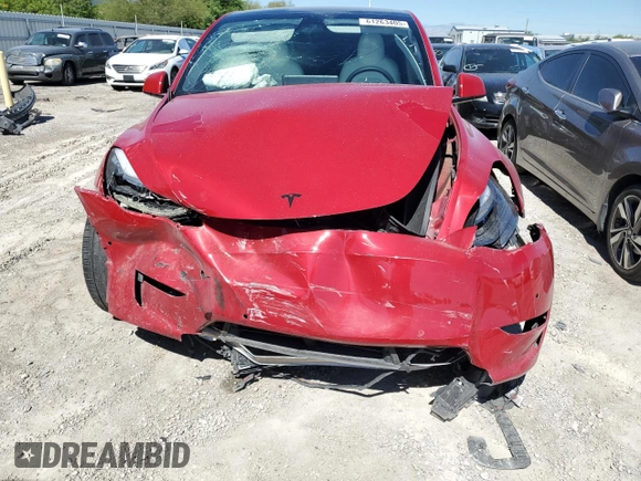 2022 Tesla Model Y Performance z VIN 7SAYGDEF9NF510183, wystawiony jako Copart lot #61263405 z przebiegiem 19 411 mil mil oraz Szkoda całkowita • Salvage title. Historia ofert i sprzedaży dostępna na DreamBid. Obrazek 5.