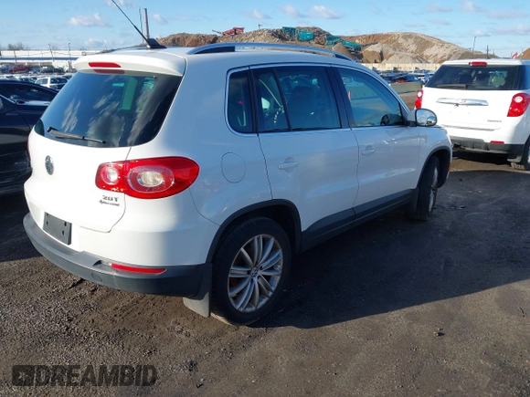2011 Volkswagen Tiguan SE with VIN WVGBV7AX8BW536365, listed as a IAAI auction lot 41854029 with 126,916 mi miles and . Bid and sale history available at DreamBid. Image 4.