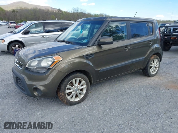 2012 Kia Soul + with VIN KNDJT2A63C7355735, listed as a IAAI auction lot 42041895 with 182,296 mi miles. Bid and sale history available at carsss.com. Image 2.
