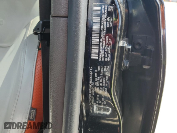 2015 Jeep Renegade Limited with VIN ZACCJBDT4FPB26634, listed as a Copart auction lot 52009035 with 92,995 mi miles and Salvage title. Bid and sale history available at DreamBid. Image 13.