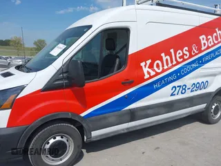 2023 Ford Transit Cargo with VIN 1FTBR1C80PKA43077, listed as a IAAI auction lot 40182475 with 15,656 mi miles and . Bid and sale history available at DreamBid. Image 15.
