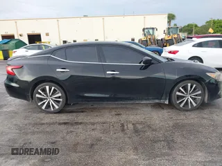 2016 Nissan Maxima SR with VIN 1N4AA6AP9GC428938, listed as a IAAI auction lot 42419663 with 121,501 mi miles and . Bid and sale history available at DreamBid. Image 13.
