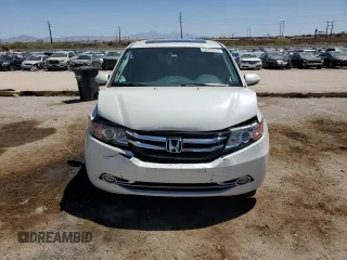 2015 Honda Odyssey Touring Elite z VIN 5FNRL5H91FB053430, wystawiony jako Copart lot #55276315 z przebiegiem 96 667 mil mil oraz Szkoda całkowita • Salvage title. Historia ofert i sprzedaży dostępna na DreamBid. Obrazek 5.
