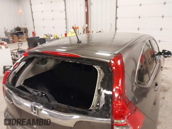 2015 Honda CR-V EX with VIN 2HKRM4H56FH670649, listed as a IAAI auction lot 42007616 with 142,353 mi miles and . Bid and sale history available at DreamBid. Image 6.