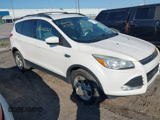 2013 Ford Escape SE z VIN 1FMCU9GX1DUC53069, wystawiony jako IAAI lot #42222328 z przebiegiem 159 245 mil mil oraz . Historia ofert i sprzedaży dostępna na DreamBid. Obrazek 1.