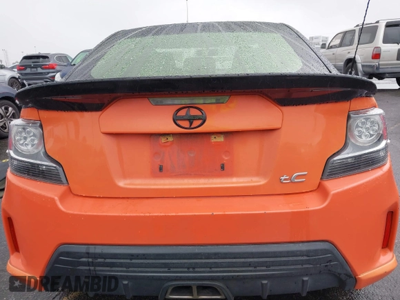 2015 Scion tC with VIN JTKJF5C79FJ007842, listed as a IAAI auction lot 41560881 with 155,436 mi miles. Bid and sale history available at carsss.com. Image 16.