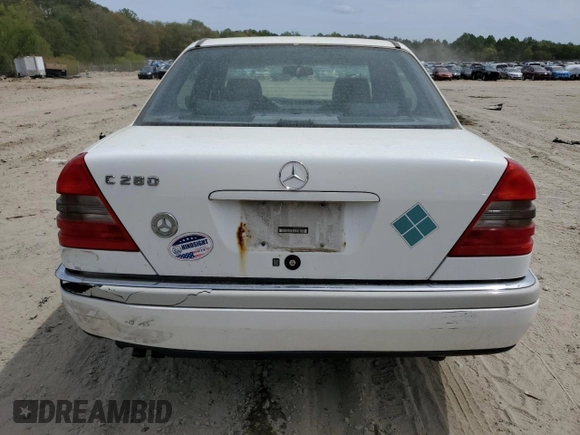 1997 Mercedes-Benz C 230/260/280/320 z VIN WDBHA28E6VA514172, wystawiony jako Copart lot #54156745 z przebiegiem 157 074 mil mil oraz Szkoda całkowita • Salvage title. Historia ofert i sprzedaży dostępna na DreamBid. Obrazek 6.
