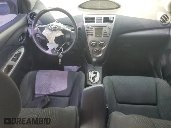 2009 Toyota Yaris with VIN JTDBT903191331207, listed as a Copart auction lot 54570165 with 232,601 mi miles and Salvage Title. Bid and sale history available at DreamBid. Image 8.