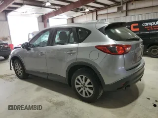 2014 Mazda CX-5 Sport with VIN JM3KE4BE4E0419882, listed as a Copart auction lot 53896815 with 127,428 mi miles and Salvage Title. Bid and sale history available at carsss.com. Image 2.