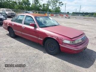 1995 Ford Crown Victoria z VIN 2FALP73W7SX173882, wystawiony jako IAAI lot #42459860 z przebiegiem 125 958 mil mil oraz . Historia ofert i sprzedaży dostępna na DreamBid. Obrazek 1.
