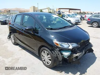 2015 Honda Fit LX with VIN 3HGGK5H51FM766607, listed as a IAAI auction lot 42520566 with 193,374 mi miles and . Bid and sale history available at DreamBid. Image 1.