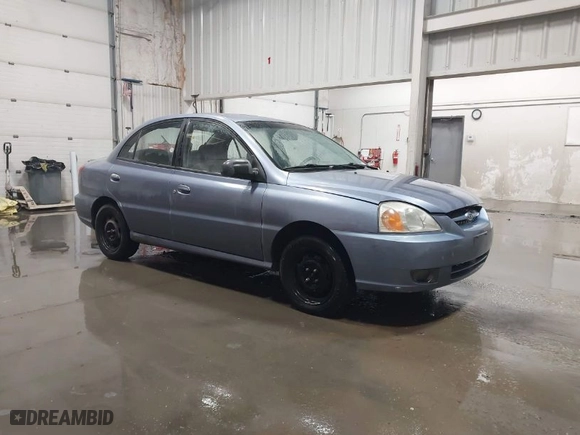 2003 Kia Rio with VIN KNADC125536274171, listed as a IAAI auction lot 41986369 with 59,837 mi miles. Bid and sale history available at carsss.com. Image 1.