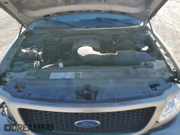2003 Ford F-150 XLT with VIN 1FTRW07623KB92840, listed as a Copart auction lot 48603105 with 145,516 mi miles and Salvage Title. Bid and sale history available at carsss.com. Image 13.