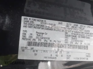 2014 Ford Focus Titanium z VIN 1FADP3N28EL208034, wystawiony jako IAAI lot #42426943 z przebiegiem 220 891 mil mil oraz . Historia ofert i sprzedaży dostępna na DreamBid. Obrazek 9.