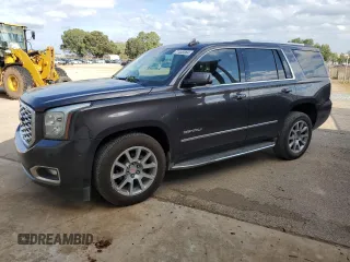 2018 GMC Yukon Denali with VIN 1GKS1CKJ4JR244135, listed as a Copart auction lot 71445964 with 148,375 mi miles and Salvage Title. Bid and sale history available at carsss.com. Image 1.