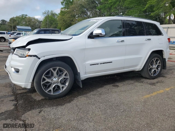 2019 Jeep Grand Cherokee Overland with VIN 1C4RJECG4KC833019, listed as a Copart auction lot 51277555 with 124,072 mi miles and Salvage Title. Bid and sale history available at carsss.com. Image 1.