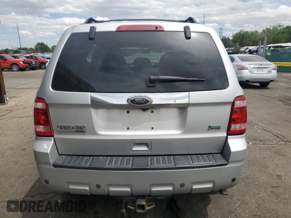 2010 Ford Escape Limited с VIN 1FMCU9EG0AKD42965, выставлен на аукционе Copart как лот 57097545 с пробегом 153 370 миль миль и Списание • Salvage title. История ставок и продаж доступна на DreamBid. Изображение 6.
