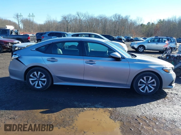 2022 Honda Civic Sedan LX with VIN 2HGFE2F2XNH545465, listed as a IAAI auction lot 41571131 with 43,866 mi miles. Bid and sale history available at carsss.com. Image 13.