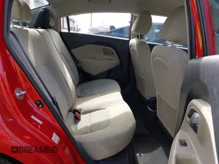 2013 Kia Rio LX with VIN KNADM4A31D6310504, listed as a IAAI auction lot 41579952 with 55,757 mi miles and . Bid and sale history available at DreamBid. Image 8.