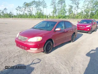 2003 Toyota Corolla CE with VIN 1NXBR32E13Z085674, listed as a IAAI auction lot 42166554 with 264,871 mi miles and . Bid and sale history available at DreamBid. Image 2.