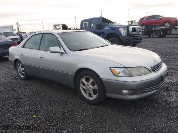 2000 Lexus ES 300 with VIN JT8BF28G9Y5088953, listed as a IAAI auction lot 41206922 with 254,063 mi miles. Bid and sale history available at carsss.com. Image 1.