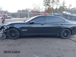 2015 BMW 7 Series 740Li xDrive with VIN WBAYF4C51FGS99074, listed as a IAAI auction lot 41222498 with 132,789 mi miles. Bid and sale history available at carsss.com. Image 14.