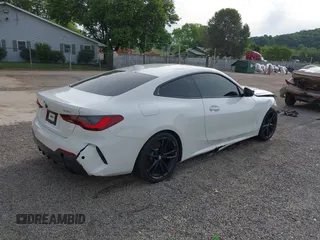 2021 BMW 4 Series 430i xDrive z VIN WBA73AP05MCG14970, wystawiony jako IAAI lot #42335790 z przebiegiem 69 926 mil mil oraz . Historia ofert i sprzedaży dostępna na DreamBid. Obrazek 4.